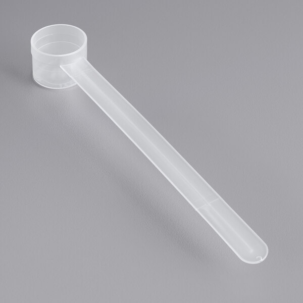 A clear plastic polypropylene scoop with a long handle.