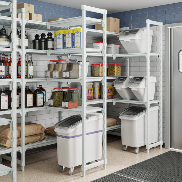 A white Cambro Camshelving Premium unit with 5 vented shelves.