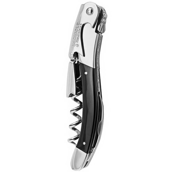 A Laguiole Tradition black and silver corkscrew with a horn handle.