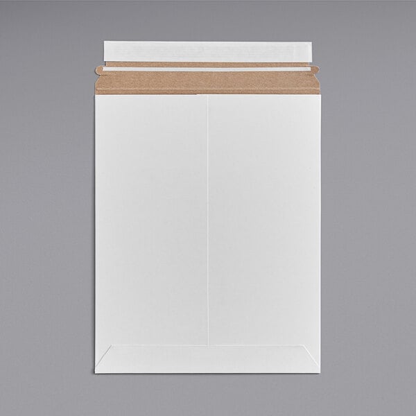 A white rectangular Lavex Stayflats mailer with brown tape.