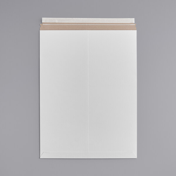 A white rectangular Lavex Stayflats mailer with brown tape.