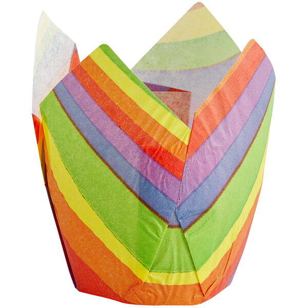 A colorful striped tulip baking cup with a rainbow design.
