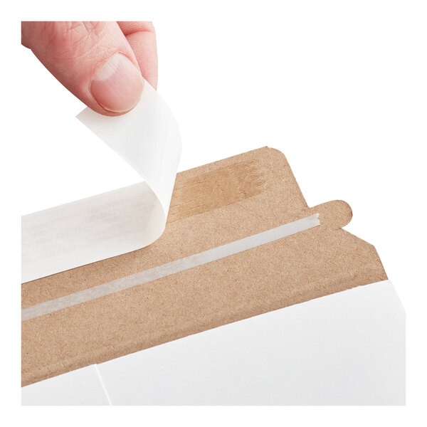 A white self-sealing rigid mailer with a peel-and-seal adhesive strip being opened.