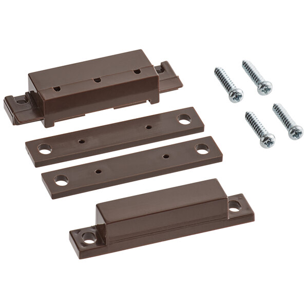 A brown rectangular plastic object with screws and holes.