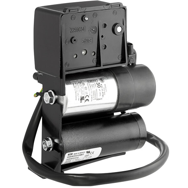 A black and silver Narvon compressor with a black cable attached.