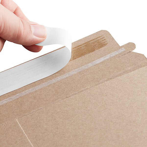 A person holding a Lavex Stayflats label.