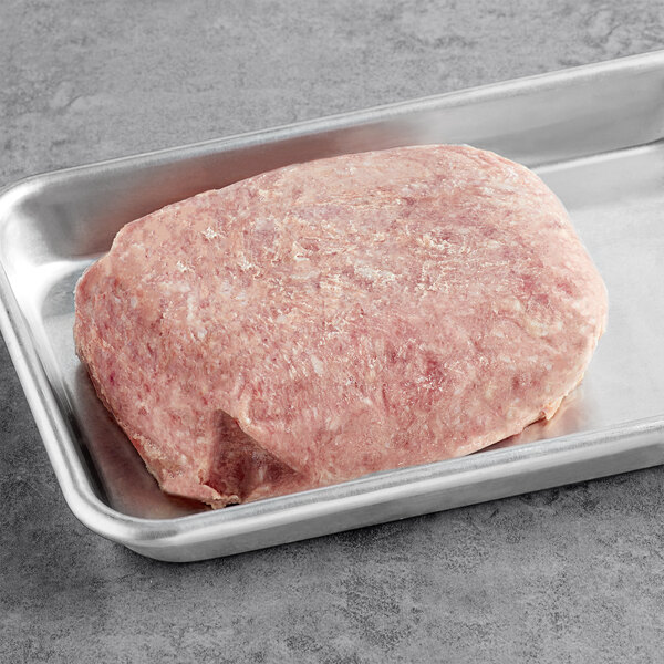 Shaffer Venison Farms ground wild boar in a metal pan on a table.