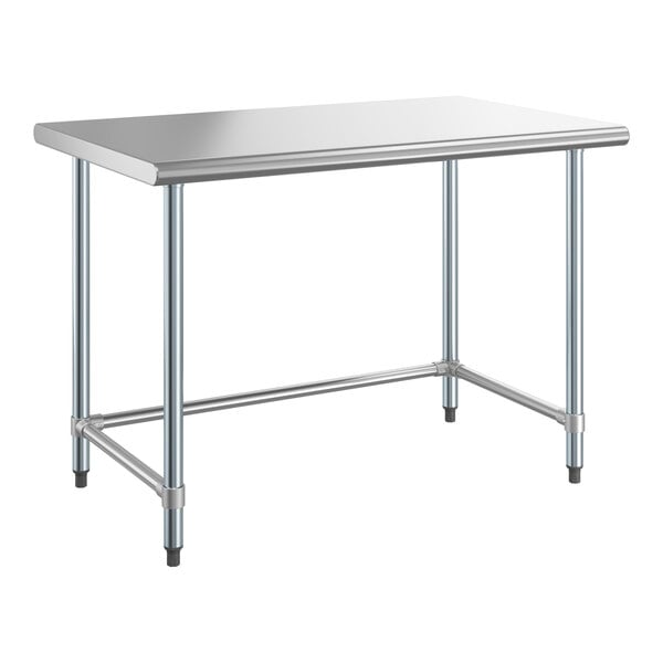 a rectangular metal table with metal legs