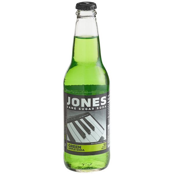 A close up of a green Jones Soda bottle.