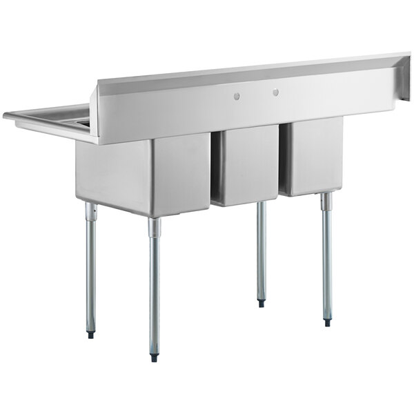 A Regency stainless steel 3 compartment sink with 2 drainboards.