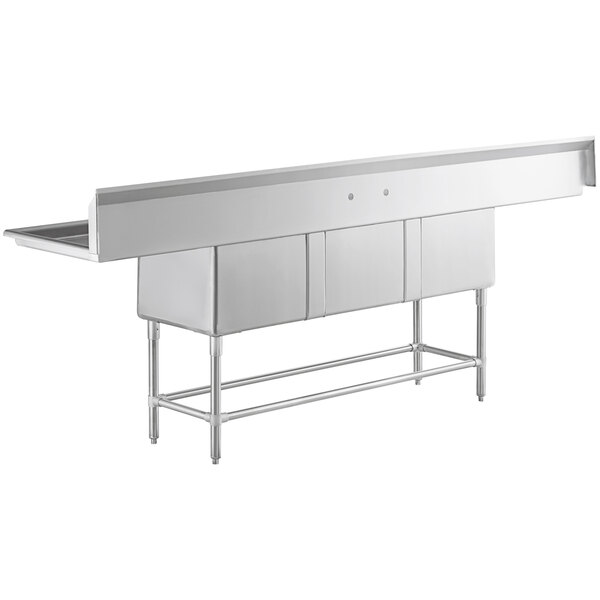 A Regency stainless steel three compartment sink with 2 drainboards.