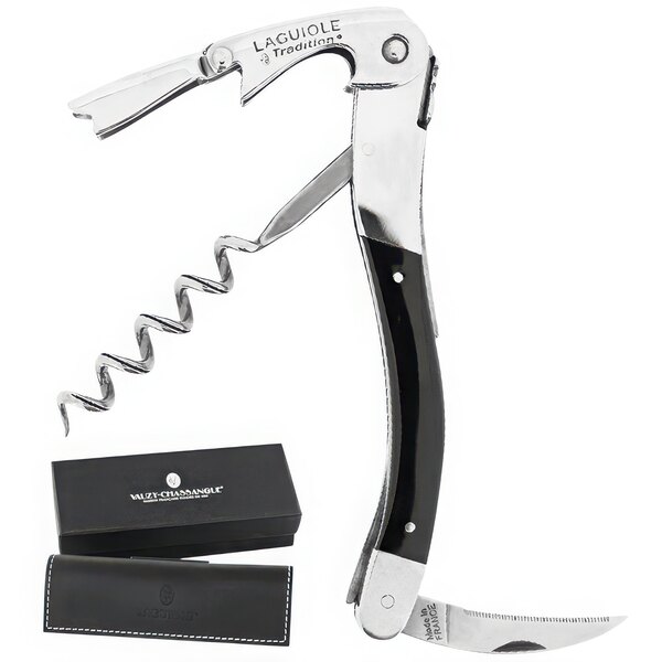 A Laguiole Tradition black and silver waiter's corkscrew with a black handle in a black case with white text.