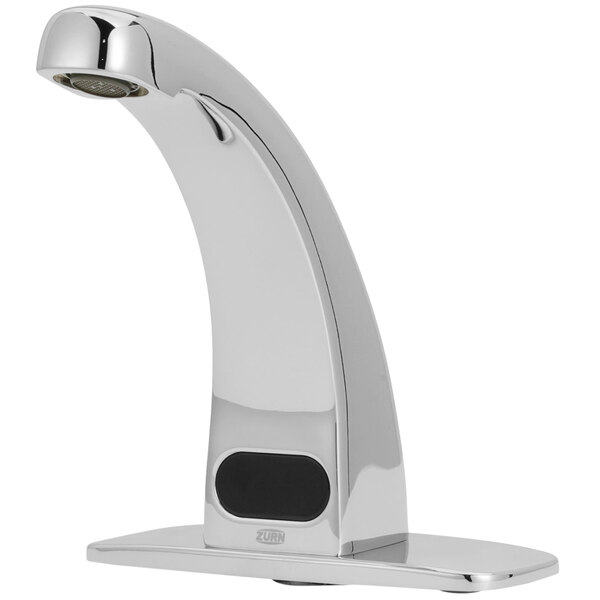 a silver faucet with a black button