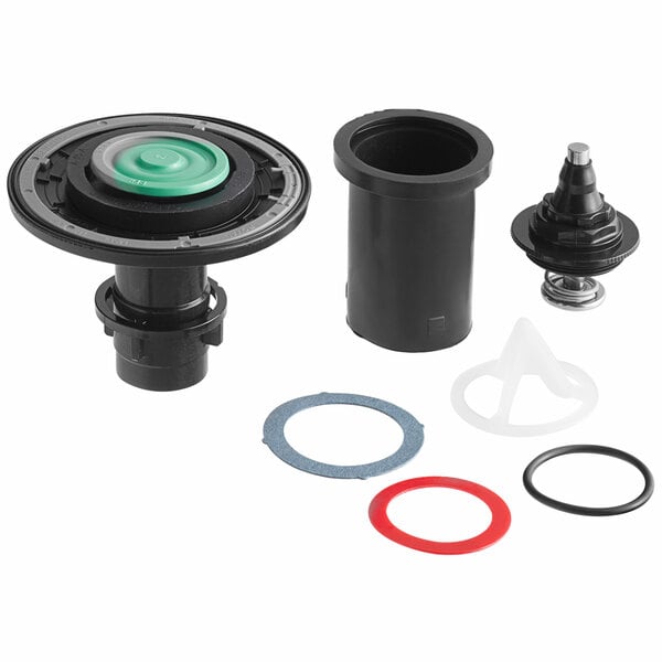 A boxed Sloan Royal Performance A1101A-BX rebuild kit for a water closet, with a black and green water valve and rubber seals.