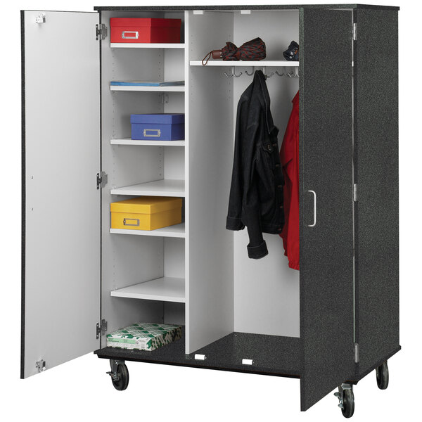 A black and gray I.D. Systems storage cabinet with white doors.