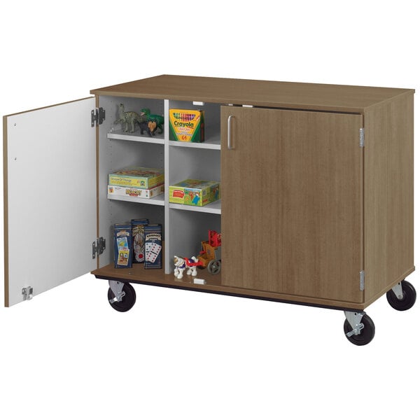 An I.D. Systems mobile cubbie storage cart with open doors.