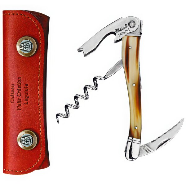 A Chateau Laguiole brown horn waiter's corkscrew in a red leather case.