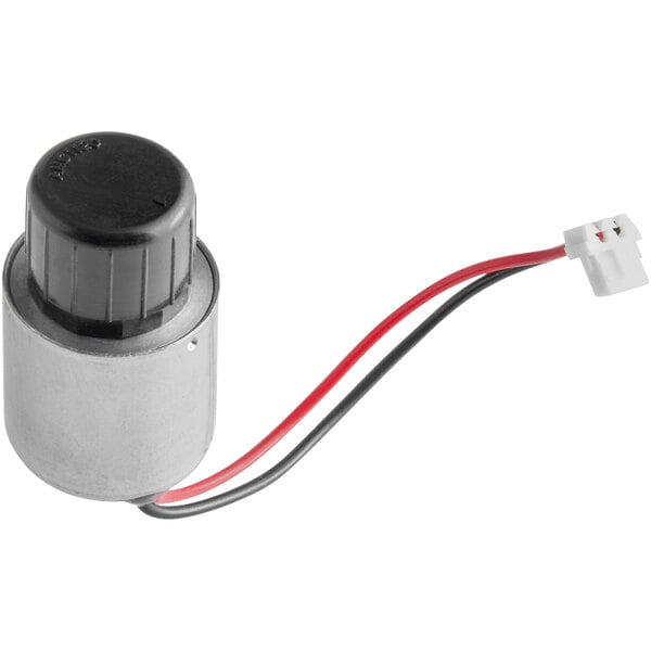 A Sloan EBV136A solenoid assembly, a small electric motor with wires and a black and silver cylinder.