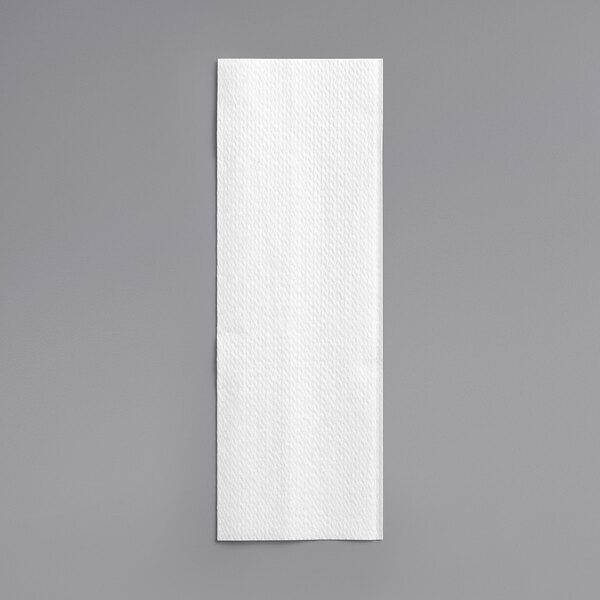A Pacific Blue Basic white paper towel on a gray background.