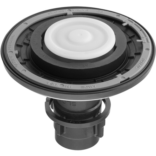 A black and white circular object, the Sloan A1038A-BX Dual Diaphragm Kit for a 3.5 GPF water closet.