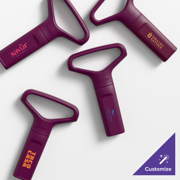 A set of burgundy two-prong cork extractors with customizable branding on the handles.