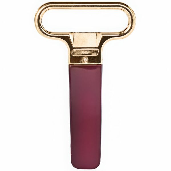 A Franmara brass-plated cork extractor with a burgundy sheath and gold prongs.