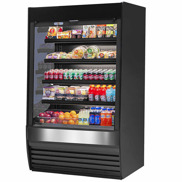 A black Federal Industries Vision Series refrigerated display case with different types of food inside.