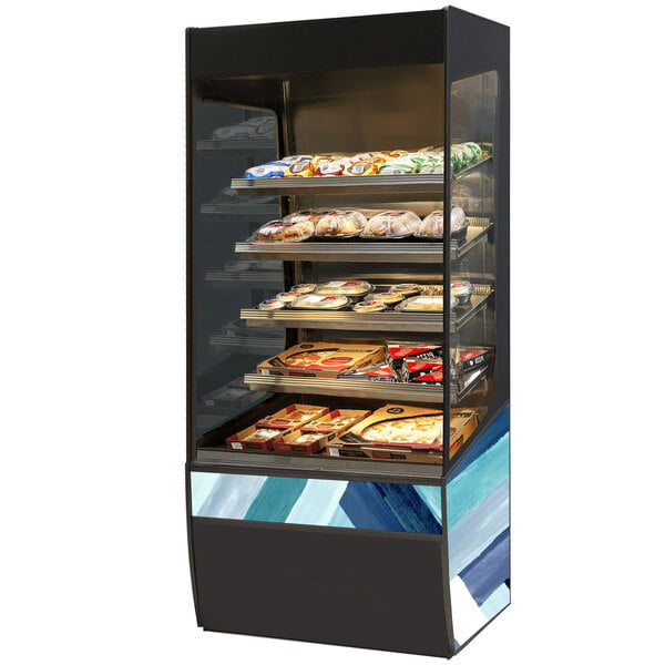 A Federal Industries Vision Series heated self-serve display case with food on shelves.