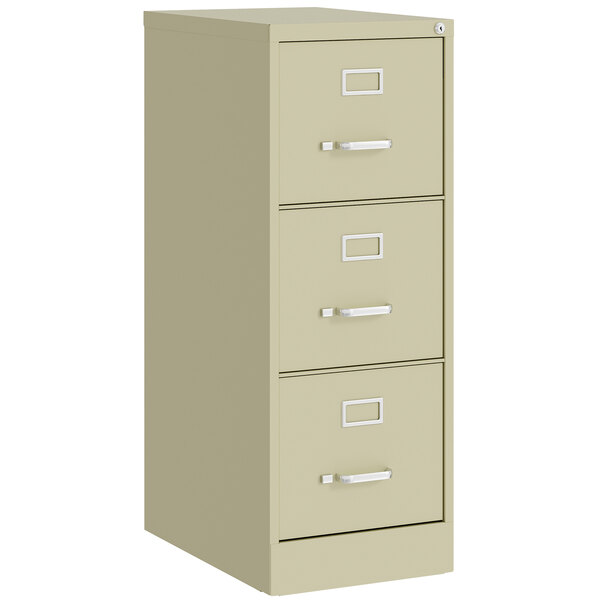 A Putty Hirsh Industries three-drawer file cabinet with silver handles.