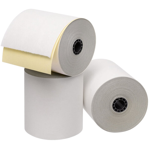 A group of Point Plus carbonless cash register paper rolls.