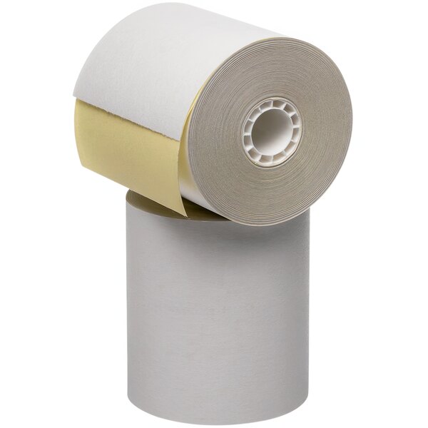 A roll of PointPlus carbonless paper with a yellow edge on a white surface.