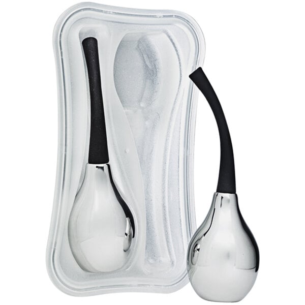 Two silver Franmara ice bells in a plastic case.