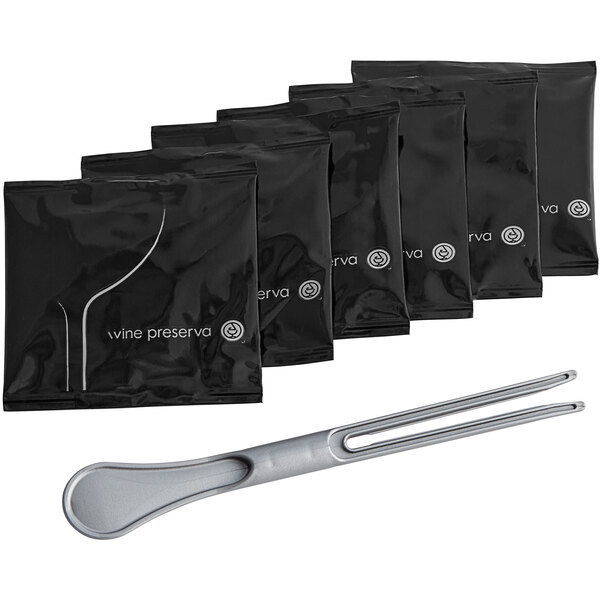 A silver fork with a hole next to black packages of Franmara Wine Preserving Discs.