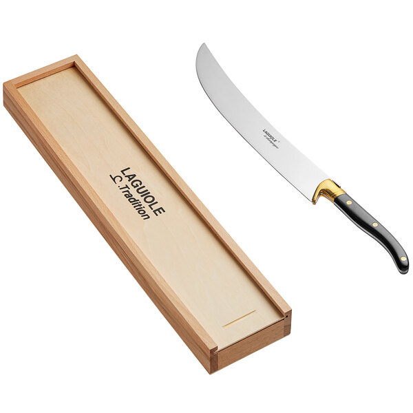 A Laguiole champagne saber with ebony handle in a wooden case.