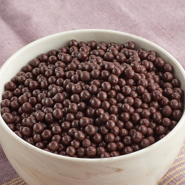 A bowl of Mona Lisa dark chocolate Crispearls.