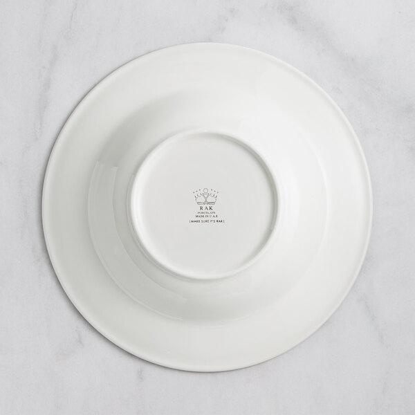 A RAK Porcelain ivory porcelain deep plate with an embossed design.