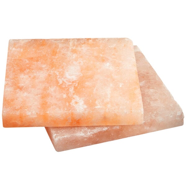A Dry Ager Saltaire salt block set with 2 Himalayan salt rocks.