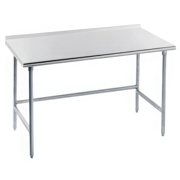 An Advance Tabco stainless steel work table with adjustable legs.