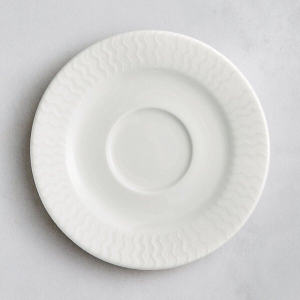 a white plate with a circular pattern