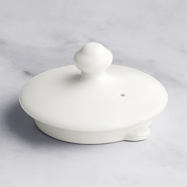 A white round RAK Porcelain lid.