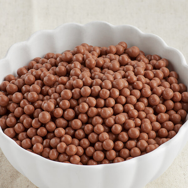 A bowl of Mona Lisa Milk Chocolate Crispearls.