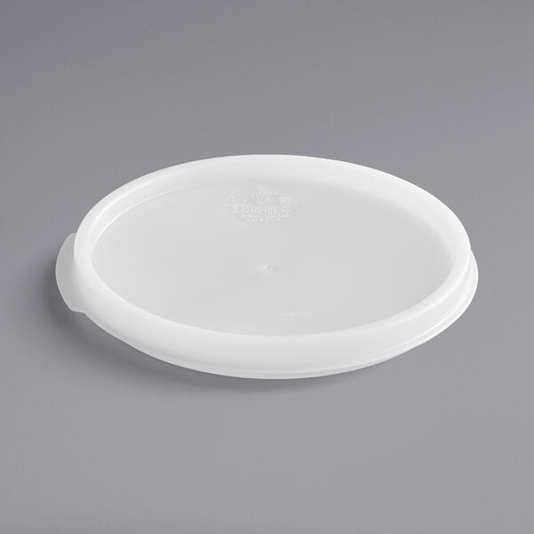 A white plastic lid for a Vigor round food storage container.