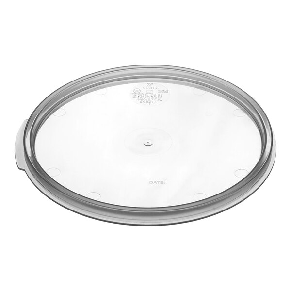 A clear plastic lid with a circular design.