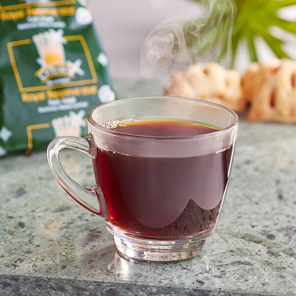 A glass of Crown Royal Reserve Sumatra Decaf Coffee with steam.