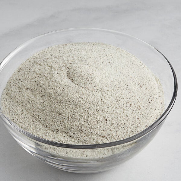 A bowl of Creamery Ave. Espresso Soft Serve Mix powder.