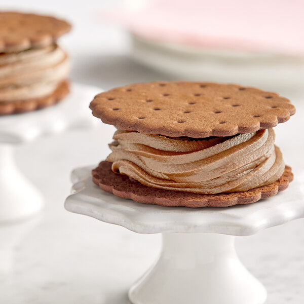 Two Creamery Ave. espresso soft serve mix ice cream sandwiches on a brown cookie.