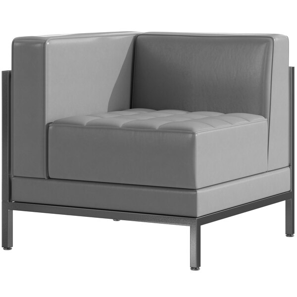 A Flash Furniture grey LeatherSoft corner chair with metal legs.