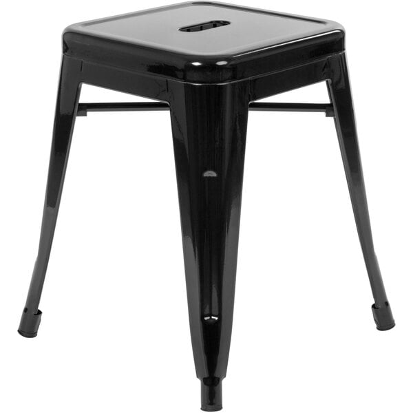 A Flash Furniture black metal backless outdoor restaurant bar stool.