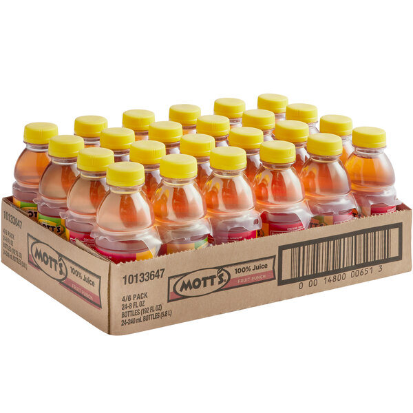 A case of Mott's Fruit Punch bottles on a table.