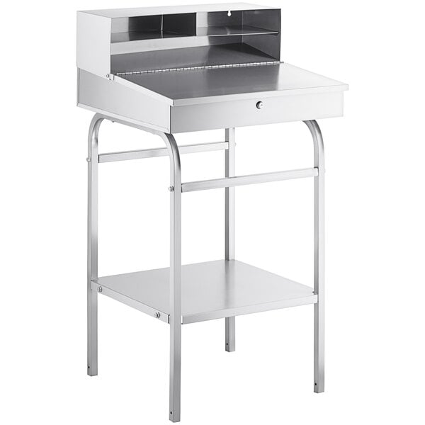 A silver stainless steel desk with a drawer.